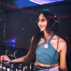 In my element, finding the perfect beat for the Saturday night crowd. A good club set is all about reading the room and keeping the energy high with a mix of new hits and throwback Bollywood anthems.