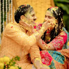 The Haldi ceremony is all about playful masti, and this moment with Kunal and Arunima was pure gold. My documentary approach means I am always ready for these spontaneous bursts of fun and color.