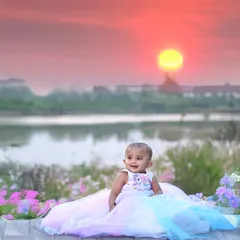 This is the edited version of the sunset portrait. I enhanced the colors of the sky and the landscape to create a more vibrant and artistic final image.