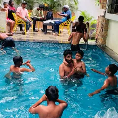 Another shot of the boys enjoying the swimming pool. It's all about creating a positive and fun environment where friendships can grow.