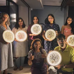 A group of proud moon-makers. Everyone's lamp is unique, and they all look fantastic lit up together.