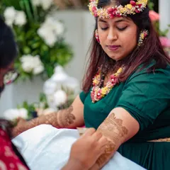 A candid moment of concentration as I work on a detailed armband for the bride. My full attention is dedicated to bringing her vision to life.