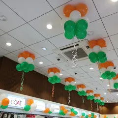 To match the entrance arch, we decorated the store's ceiling with these beautiful tricolour balloon bunches. This kind of ceiling decor for Republic Day or Independence Day helps create a complete festive look inside the space.