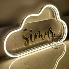 A side view highlighting the sleek profile of the cloud neon sign. It's a stylish and modern piece of wall decor.