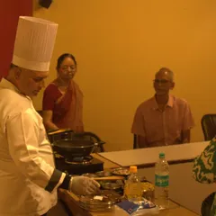 Our chef demonstrates the art of Ayurvedic cooking to a group of curious guests. These interactive sessions teach the principles of cooking for balance and health, empowering you to continue your wellness journey at home.