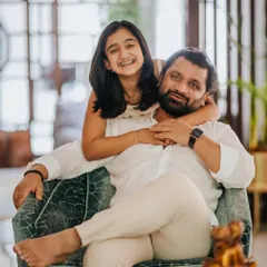 A beautiful, tender moment between a father and daughter. The comfort of being at home allows for these natural and heartfelt interactions to unfold in front of my camera.