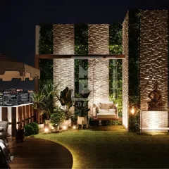 This terrace features a beautiful mix of natural elements, including a vertical garden wall and a comfortable swing. It's the perfect urban escape for quiet evenings.