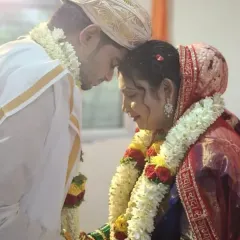 A tender moment from Snehal and Dinesh's wedding, where they connect in a moment of quiet reflection. This image captures the deep, unspoken bond that is nurtured through shared spiritual practices.