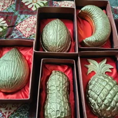 Showcasing my unique collection of festive urli candles crafted from aluminum in shapes like pineapples, peanuts, and cashews. These are packed in elegant gift boxes, making them ideal for Diwali gifting.