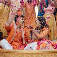 The Haldi ceremony is a riot of colour, laughter, and love. We dive right into the heart of the celebration to catch these vibrant, candid moments of pure, unadulterated fun between the couple and their loved ones.
