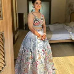 A dreamy engagement look for Jenice. Her makeup is soft and romantic, with a touch of sparkle on the eyes, perfectly matching her beautiful floral lehenga.