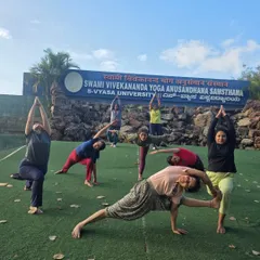 Our team enjoying a moment of practice and togetherness at the Swami Vivekananda Yoga Anusandhana Samsthana (S-VYASA) in Bangalore. These visits enrich our knowledge, expose us to the latest in yogic research, and strengthen our team bond.