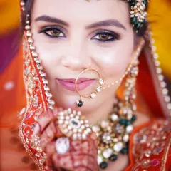 A close-up shot focusing on the bride's expressive eyes and flawless makeup. Capturing these details is essential for a complete bridal lookbook.