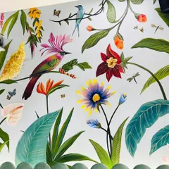 Another detail from the vibrant tropical wall mural, highlighting the colorful birds and exotic flowers. I used high-quality acrylics to ensure the colors are bright and long-lasting.