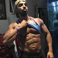 You need a strong core to build a strong body. Here I'm showing my defined abs, a result of consistent training and a strict diet.