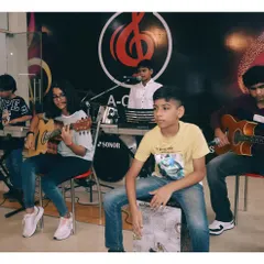 A full band jam session right here at the academy. Students on keyboard, guitar, and cajon are learning to sync up and create music together. These sessions are a regular part of our curriculum.