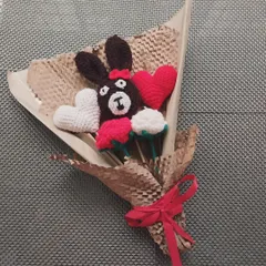 A truly unique custom bouquet I made for a client, featuring a teddy bear face, hearts, and roses. If you have a special idea for a bouquet, I would love to bring it to life.