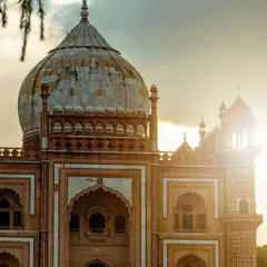 Capturing Safdarjung Tomb as the sun sets. The golden light catching the side of the dome brings out the warm colors of the stone and adds a beautiful glow to this historical landmark.