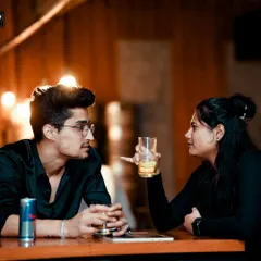 A couple enjoying a drink and the atmosphere at Ozone. My sets are not just for dancing; they create the perfect backdrop for a great night out.