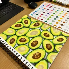A full-page spread of avocados drawn with alcohol markers. I focused on capturing the texture and color variations of the fruit, using a color swatch to keep my palette consistent.