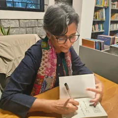 A special moment as author Mandira Shah signs a copy of her book, 'Children of the Hidden Land'. Getting a personalized autograph is a memory our members will cherish forever.