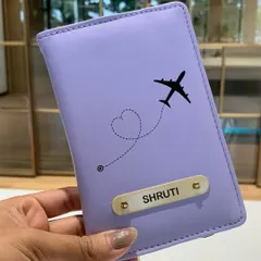 A minimal and elegant personalized passport cover in a lovely lavender shade. The custom nameplate and airplane motif make it a perfect gift for a travel lover.