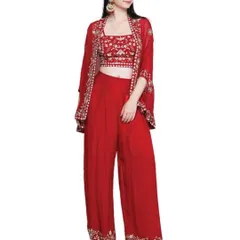 This vibrant red three-piece set, featuring a crop top, palazzo pants, and a matching embroidered jacket, is a modern take on festive wear. It's a versatile outfit that offers both style and comfort for any celebration, from a mehendi ceremony to a festive party.