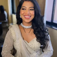 Glow so soft, glam so strong. This reception look features a flawless base, defined eyes, and a beautiful smile, perfect for an evening celebration.