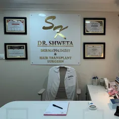 This is my consultation room, where we will discuss your skin concerns. I ensure my practice is equipped with modern tools and my credentials are on display to give you confidence in the care you will receive.