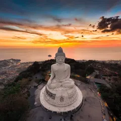 Capturing the peace of a fiery sunset over the Big Buddha in Phuket, Thailand. My international trips are about finding these moments of calm and beauty in incredible places.