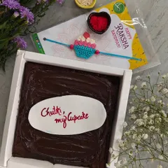 Another one of our popular Rakhi hampers, this one with a cute cupcake crochet Rakhi and a brownie that says "Chutki, my cupcake". We love creating these personalized, sweet combinations.