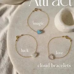 These are my cloud bracelets, each hand-carved from a unique gemstone to carry a different energy. Labradorite for magic, white moonstone for luck, and rose quartz for love.