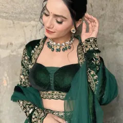 A beautiful shot of the completed look for the awards night. The emerald green velvet lehenga was paired with a soft smokey eye, radiant skin, and an elegant updo.