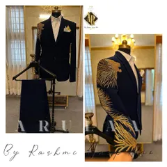 This handcrafted wedding suit is a testament to my love for detail. I designed this for a groom who wanted something powerful and unique. The deep navy fabric is the perfect canvas for the custom zardosi embroidery of a roaring lion, which flows from the shoulder down the sleeve.