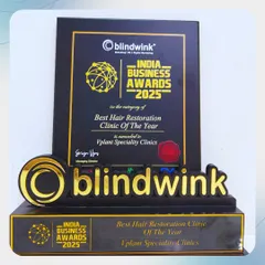 A close-up of our trophy for "Best Hair Restoration Clinic of the Year 2025." This award from the India Business Awards by blindwink reflects our commitment to world-class treatments and natural results.