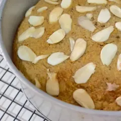 Freshly baked and cooling, this French Almond Cake is topped with sliced almonds for extra crunch and nutty flavor. It’s a simple, elegant, and wholesome treat.