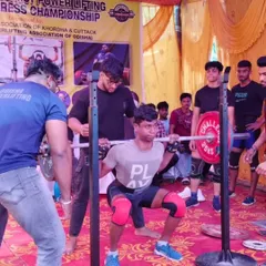 A young lifter showing great form at a district championship. We build our athletes from the junior ranks up.