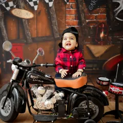 Let's have some fun! I offer a wide range of creative and themed photoshoots, like this cool little biker setup, complete with a miniature Royal Enfield.
