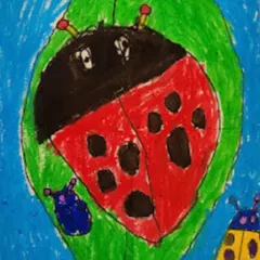 This preschooler's artwork shows great progress in controlling their coloring and staying within the lines, a key fine motor skill we develop.