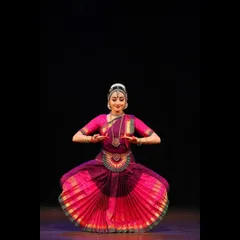 The fan-like spread of the costume in this pose is not just for aesthetics; it accentuates the geometry and lines of the body. This is from a performance where every detail was guided by my Guru.