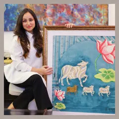 My heritage is my greatest inspiration. Here I am with a piece from my Heritage Collection, a modern interpretation of traditional Pichwai art. This hand-embroidered artwork, featuring the sacred Nandi, connects my roots in Rajasthan with my contemporary artistic practice.