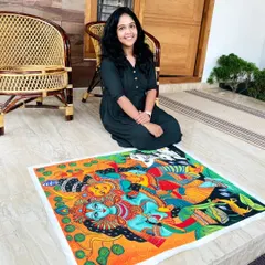 Me with the finished Radha Krishna painting, a piece I truly loved creating. The colors are so vibrant and full of life.