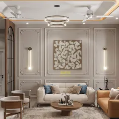 For this living area, I created a feature wall with classic European-style molding and modern sconce lighting. The neutral color palette allows the furniture and art to stand out, resulting in a space that feels both timeless and contemporary.
