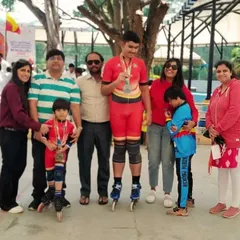 Our national medalists, Shubham and Rayaansh, celebrating their victory with their supportive families and coaches.