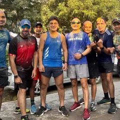 The men of the tribe, covered in Holi colors after a tough workout. We train hard and celebrate with equal passion.