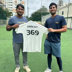 A player proudly displays his jersey with his chosen number. These small touches help build a professional and aspirational team environment.