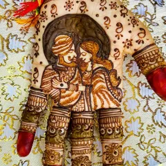 A close up of a custom couple portrait, capturing a special moment for the bride. I love working with you to bring these personal stories to life in your engagement or wedding henna.