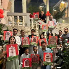 The team from Isprava holding up their finished Portuguese window paintings. I love seeing how each person adds their own unique touch to the same theme.