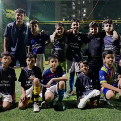 We play with an elite mentality and a hunger to win. Here, our U11 Elite boys celebrate a decisive 7-1 victory in a friendly match, showcasing the winning culture we instill from a young age.
