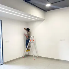 The first line on a blank wall is always a special moment. This is the very start of a project, where the entire space is a canvas waiting for a story to be told.